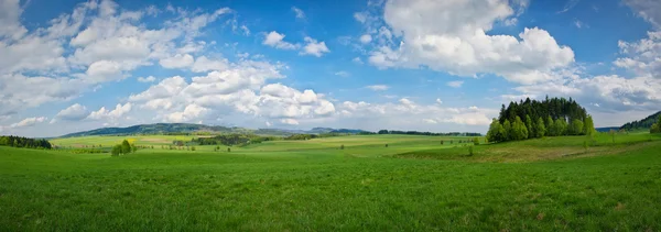 Spring panorama in the hills — Stock Photo, Image