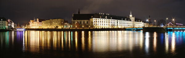 Night panorama with buildings and river