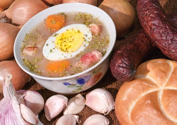 Traditional sour flour-based soup with egg — Stock Photo, Image