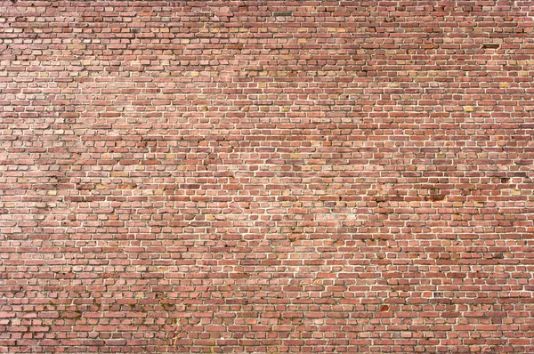 Struttura della parete per sfondo con piccoli mattoni marroni — Foto Stock