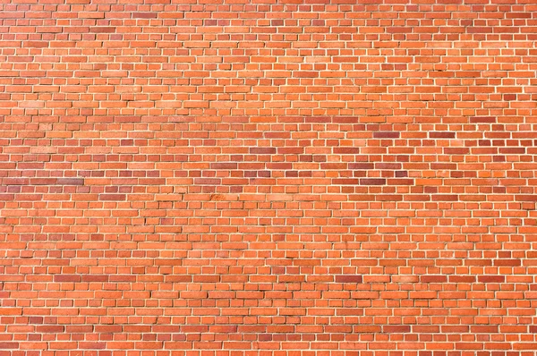 Wall texture for background with small red bricks — Stock Photo, Image