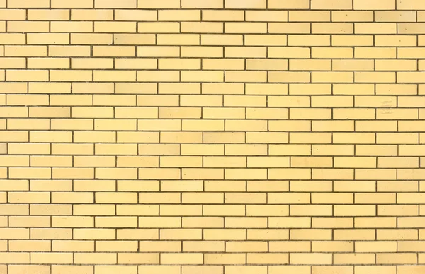Parede para textura de fundo com tijolos amarelos — Fotografia de Stock