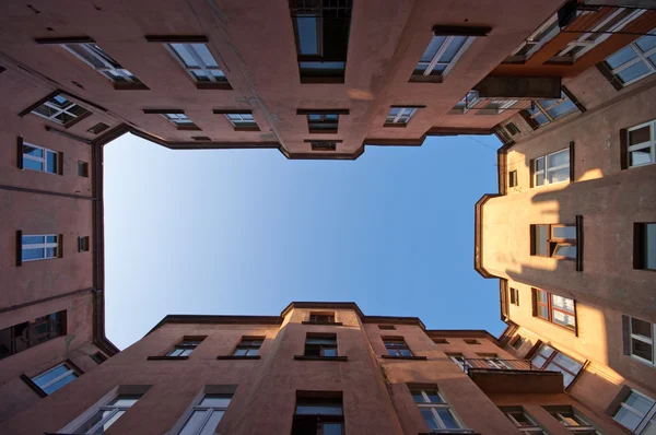 stock image Symmetrical view on the old block