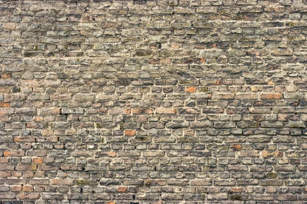 Стена со старыми кирпичами — стоковое фото