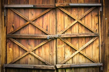 Wooden door with four crosses clipart