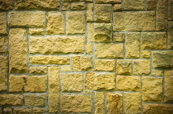 Konstiga brickwall med gröna block — Stockfoto