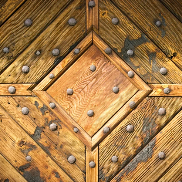 Abstract wooden texture with hobnails — Stock Photo, Image