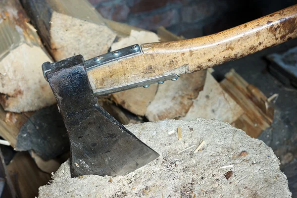 stock image Big axe in the trunk