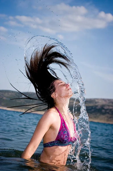 Water splash by hair — Stock Photo, Image