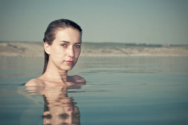 stock image Young woman in the water