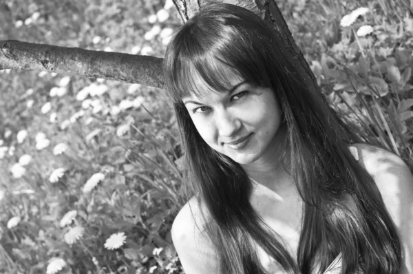 stock image Young attractive girl in the garden