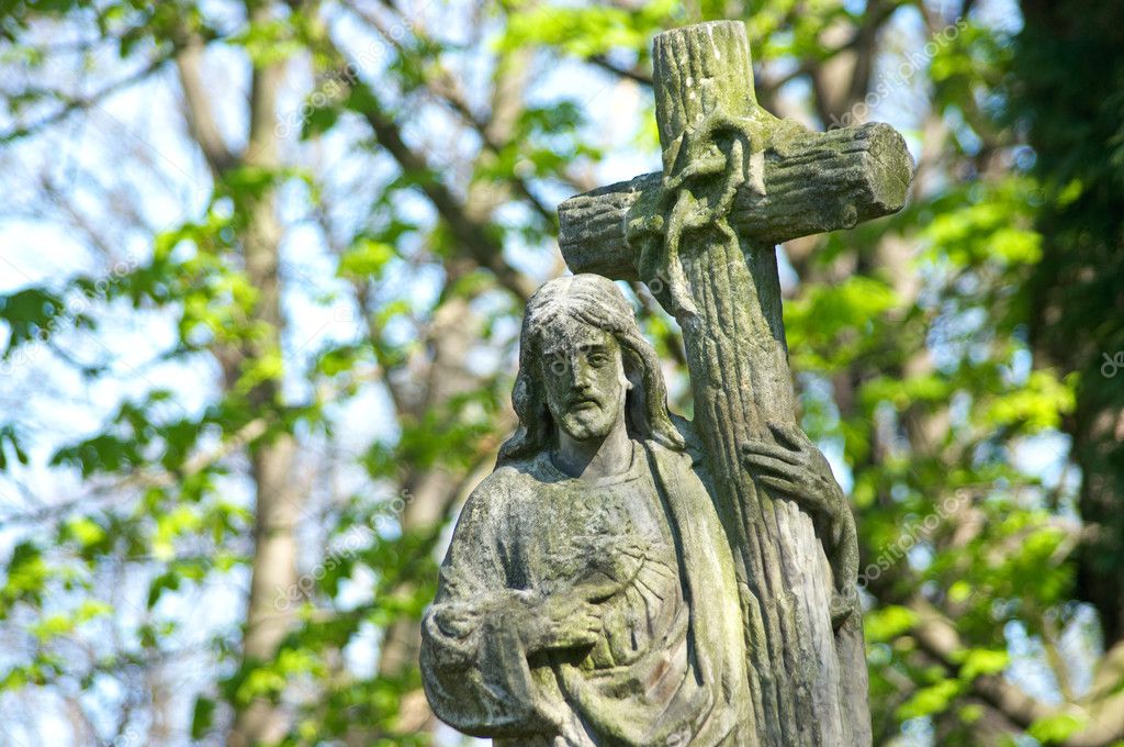 Very old stone Christ statue on tomb in graveyard — Stock Photo ...