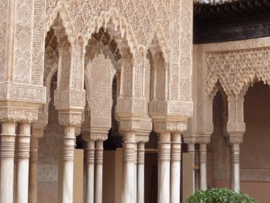 Decorated arches and columns in the Alhambra clipart