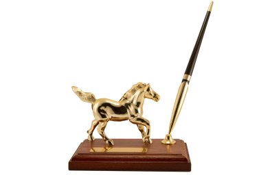 Figurine of a gold horse separately on a white background clipart