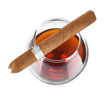 Cognac in goblet with cigar clipart