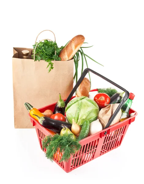 Basket and bag with products — Stock Photo, Image