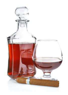 Cognac in goblet with cigar clipart