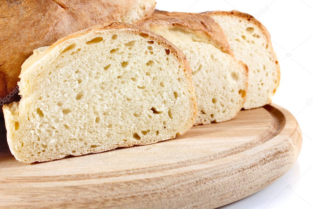 Homemade bread on wooden breadboard