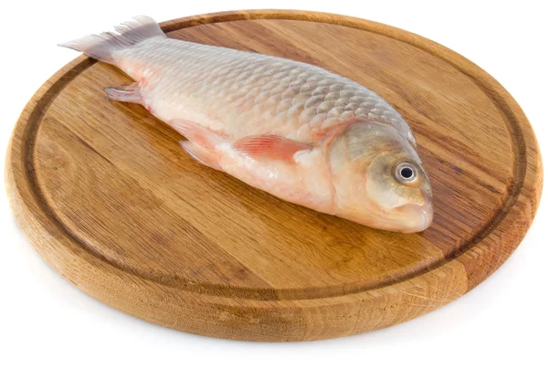 Fish on wooden board — Stock Photo, Image