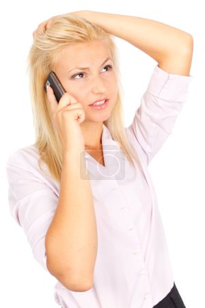 Femme d'affaires stressée au téléphone 