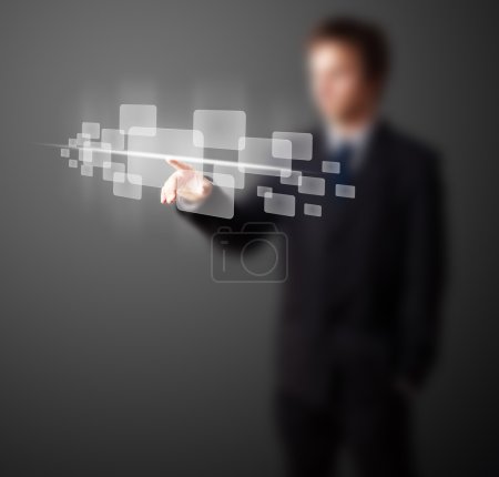 Homme d'affaires appuyant sur le type high tech de boutons modernes