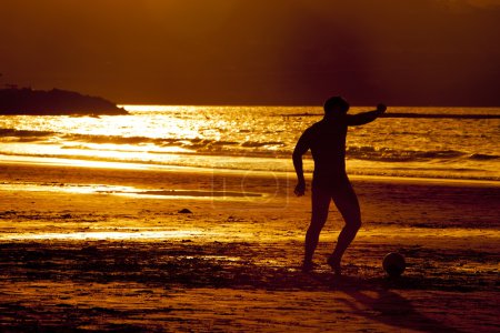Coucher de soleil football 