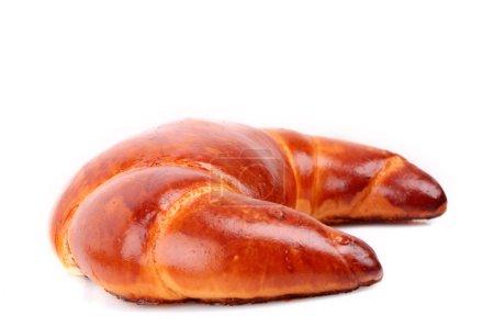 Rouleau croissant isolé sur blanc 